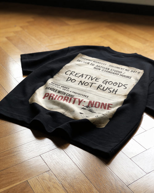 HANDLE WITH CARE OVERSIZED T-SHIRT