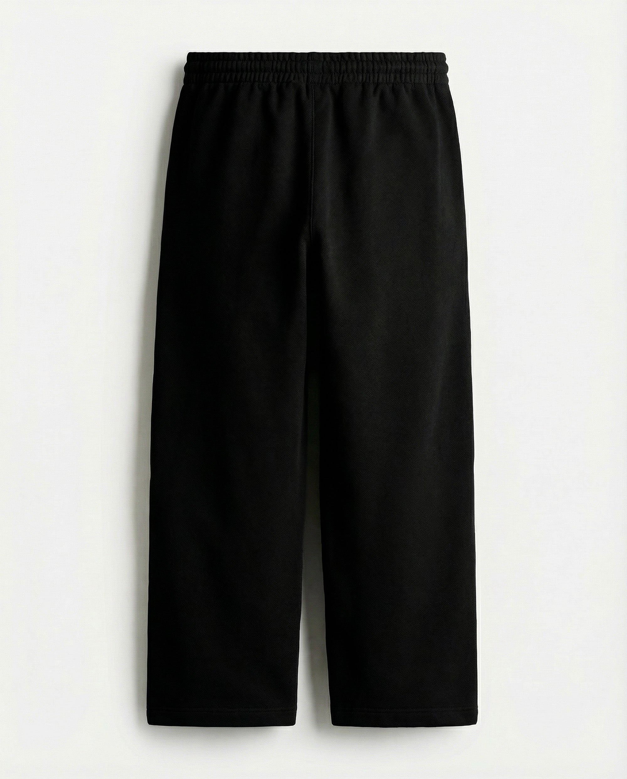 Black pants on a light gray background