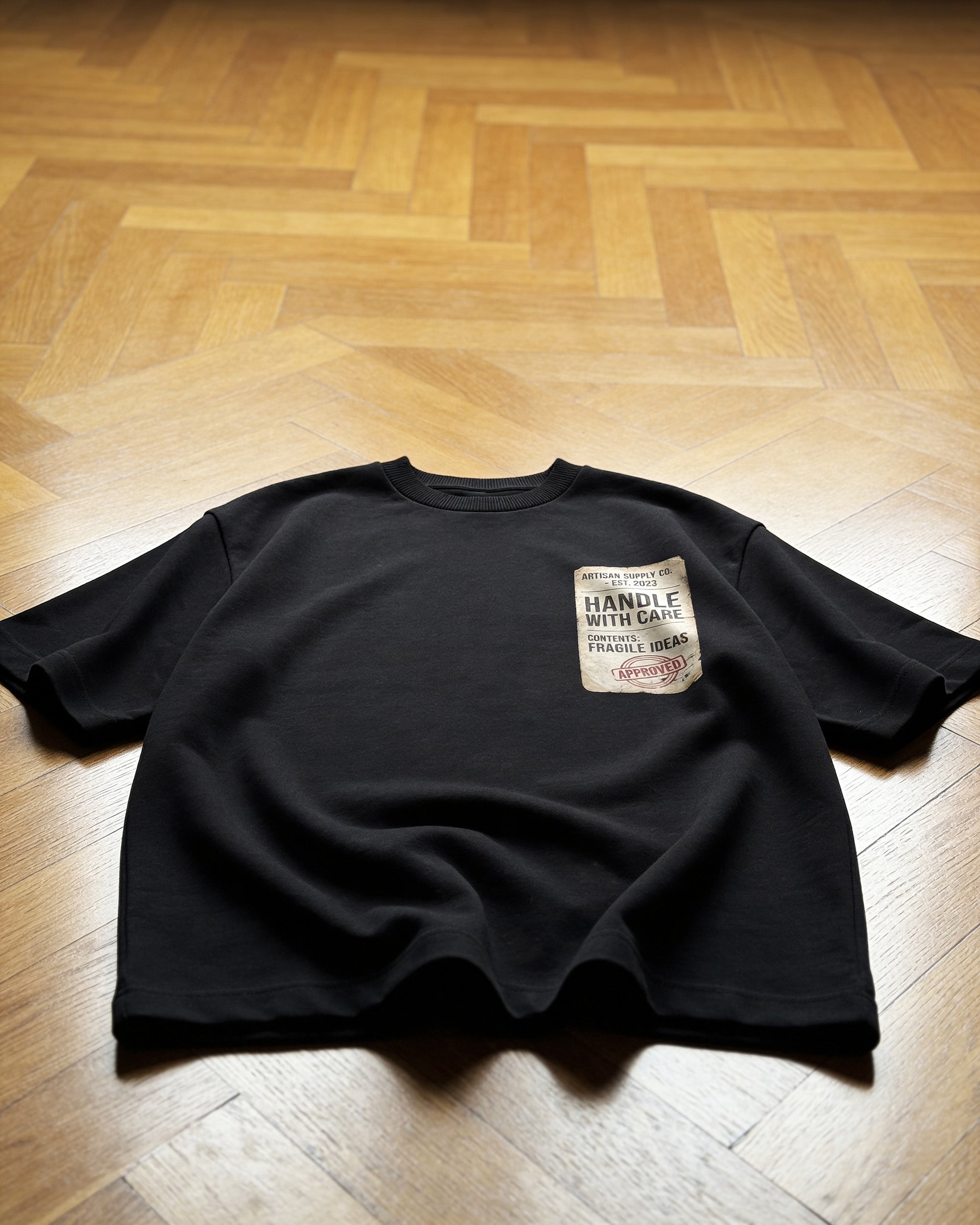 HANDLE WITH CARE OVERSIZED T-SHIRT