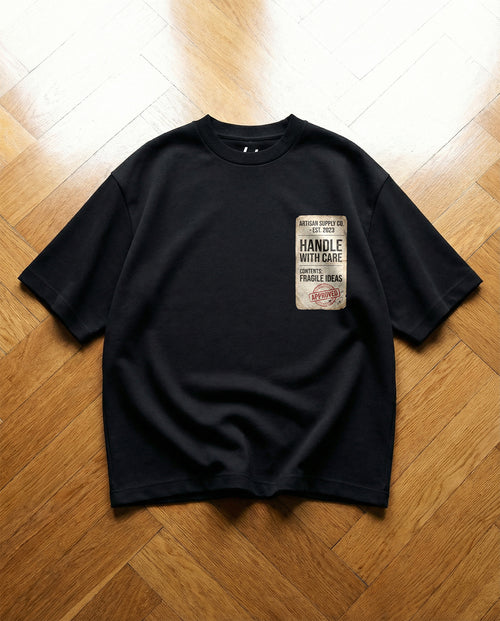HANDLE WITH CARE OVERSIZED T-SHIRT
